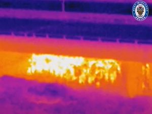 Supporting image for story: Woman rescued from river and motorway closed as illegal rave beneath bridge shut down by police