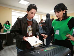 Supporting image for story: Georgia’s opposition disputes result of crucial vote