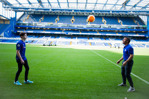 Ed enjoys a kick-around with Chelsea hero Zola