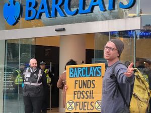 Supporting image for story: Shropshire climate protestors forced bank closure during day of action
