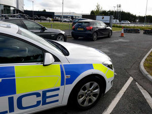 Supporting image for story: Travellers move on after setting up near Wolverhampton Porsche showroom