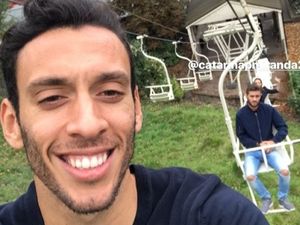 Supporting image for story: Wolves player riding high at zoo