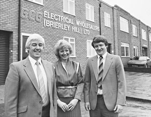 GCG Electrical Wholesalers (Brierley Hill) Ltd, Albion Street, Brierley Hill. Pictured in November 1986 is Barry and Gwen Guest with Brian Evans celebrating 10 years of trading.