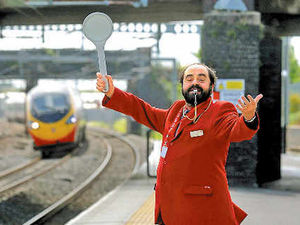 Supporting image for story: 'Pavarotti' station worker always on song