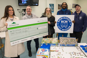Izzi Prudhoe from DWH joins reps of Birmingham City Mission