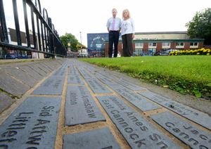 Mike Mellor, treasurer and vice chair of CHAPS, and Sheila Harding, secretary of CHAPS, next to the miners memoria stones in Market Street, Hednesford