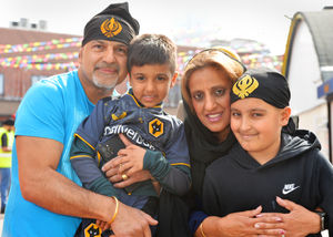 Attending the Vaisakhi parade taking place in Wolverhampton were the Bisla family, (left-right) Dal, Sunny, aged 5, Gurbachan, and Ruben, aged 10..