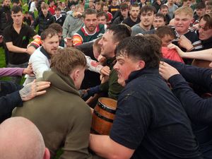 Players from the villages of Hallaton and Medbourne battle for the ‘bottle’ during the annual game of bottle kicking in Leicestershire