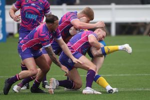 The Hurricanes tackled hard throughout the game. Photo: Andy Shaw