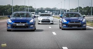 Julian Wilson, centre, and Adrian Harold, right, taking part in the Cannon Run with a Nissan similar to the one driven by Dave Bentley