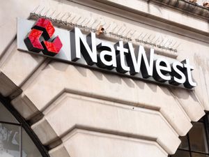 A NatWest sign outside a bank branch