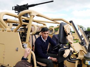Supporting image for story: Rishi Sunak gets behind the wheel of an armoured car in visit to South West