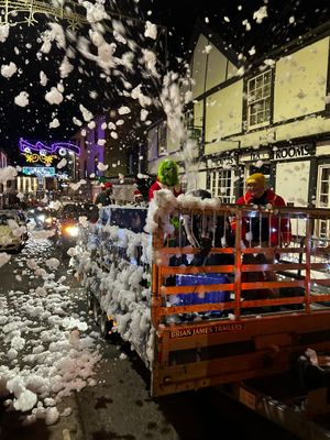 Builth Wells Mayor Councillor Gwyn Davies promised snow for the Christmas event and here he is delivering snow!
