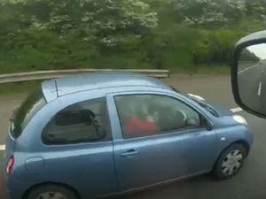 Supporting image for story: Woman applying make-up among unsafe motorway drivers caught on camera by police