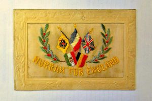 A patriotic postcard featuring the flags of the Allies, including Belgium and France