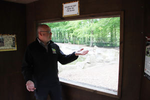 Zoo director Derek Grove with the graffiti tags to one of the enclosures
