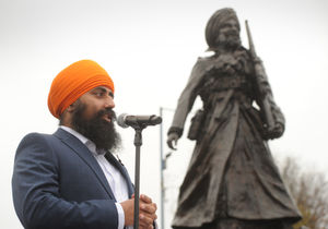 Jaswinder Sign speaking during the unveiling of the Lions of the Great War statue