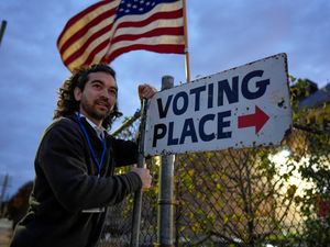 Supporting image for story: In Pictures: Americans head to the polls to choose between Harris and Trump
