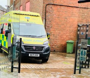 The ambulance could be seen at the entrance to the Mander Centre