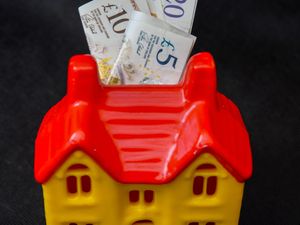 A house-shaped money box