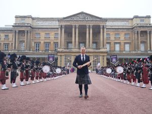 Sir Chris Hoy starts the King’s Baton Relay at Buckingham Palace