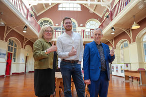 Wendy Stephens (WAC Chair of Board of Trustees), Councillor Chris Burden (Cabinet Member for City Development, Jobs and Skills) and Trevelyan Wright (WAC Chief Executive) celebrate securing the long-term future of the centre