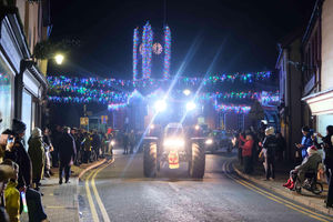 The tractors coming back into Kington High Street to cheers from hundreds of spectators. Image by Andy Compton