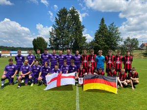 Supporting image for story: Junior football team returns after 'adventure of a lifetime' to take on twin city rival