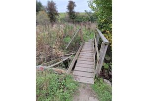 Police are appealing for information after criminal damage was reported to a public footbridge in Gobowen. Pic: West Mercia Police