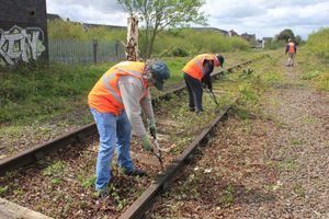 Members of Back The Track begin work on clearing the disused railway line near the former water pumping station at Sandfields. Credit: Lichfield District Council. With permission for all LDRS partners