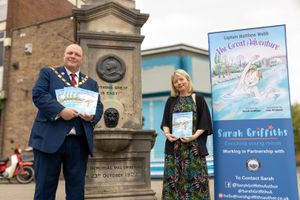 Cllr Ben Carter - Mayor of Great Dawley, with Sarah Griffiths - Author of Captain Matthew Webb The Great Adventure, standing next to the Captain Webb Memorial in Dawley High Street
