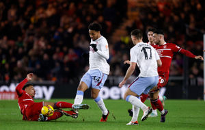 Middlesbrough's Morgan Rogers and Aston Villa's Boubacar Kamara