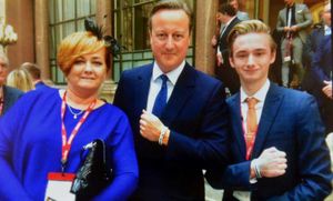 Suzy and Owen Richards with Prime Minister David Cameron, wearing Smile for Joel charity wristbands