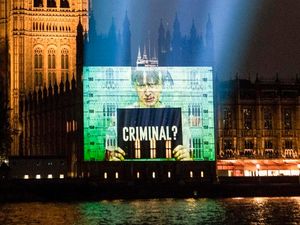 Supporting image for story: Boris Johnson depicted as criminal in giant Parliament projection