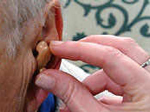 Supporting image for story: Long waits for hearing aids