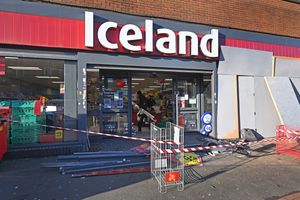 The frontage of the store was closed off the morning after the crash