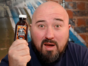 The sauce James is holding measures at nine million scovilles and contains four different chilli's