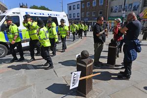 A large contingent of police officers arrived at the scene as tensions rose
