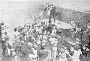 1931 – Father Christmas distributes toys to needy children in Dudley following a Star appeal.