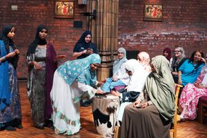Local ladies enjoy activities including Henna tattoos.