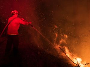 Supporting image for story: California firefighters make progress amid blaze devastation