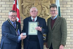 Hamish Stonebridge of Llandrindod Wells Royal British Legion with the Chairman of Powys County Council, Councillor William Powell and Powys County Council Leader Councillor Jake Berriman