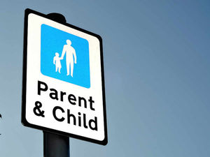 Supporting image for story: Parent and child parking