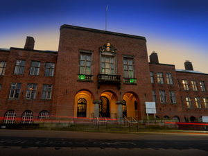 Supporting image for story: Buildings lit up green for mental health awareness