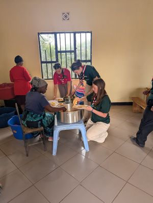 The Girl Guides helped make food for people on their Tanzania trip