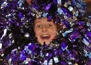 Cheerleader Rachel Tope, aged 12, joins the celebrations