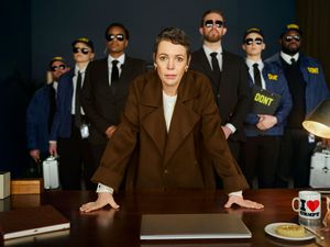 Olivia Colman looking stern in a TV advert