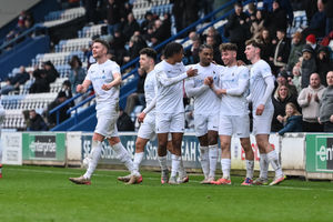 AFC Telford United players and fans celebrate after Remi Walker (AFC Telford United Midfielder) gives AFC Telford United a 3-1 lead after he curls a free kick from the edge of the box past the Alfreton Town keeper (Picture: Kieren Griffin)