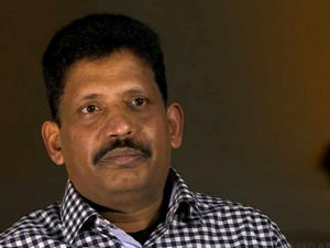 Supporting image for story: Caught on CCTV: Petrol station manager attacked and robbed in street in front of son, 7