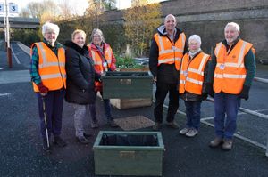 The Friends of Wellington Station members Kath Howard, Cllr Julie Pierce, Antony Hook, Kath Padgett, David Bunn, and Telford College construction lecturer Angela Pitchford.